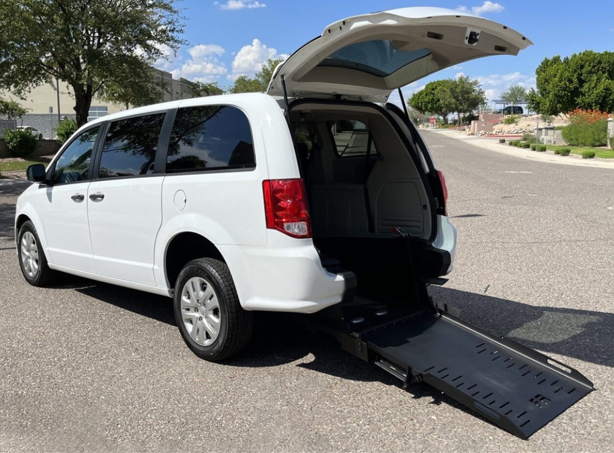 wheelchair accessible minivan with rear ramp deployed