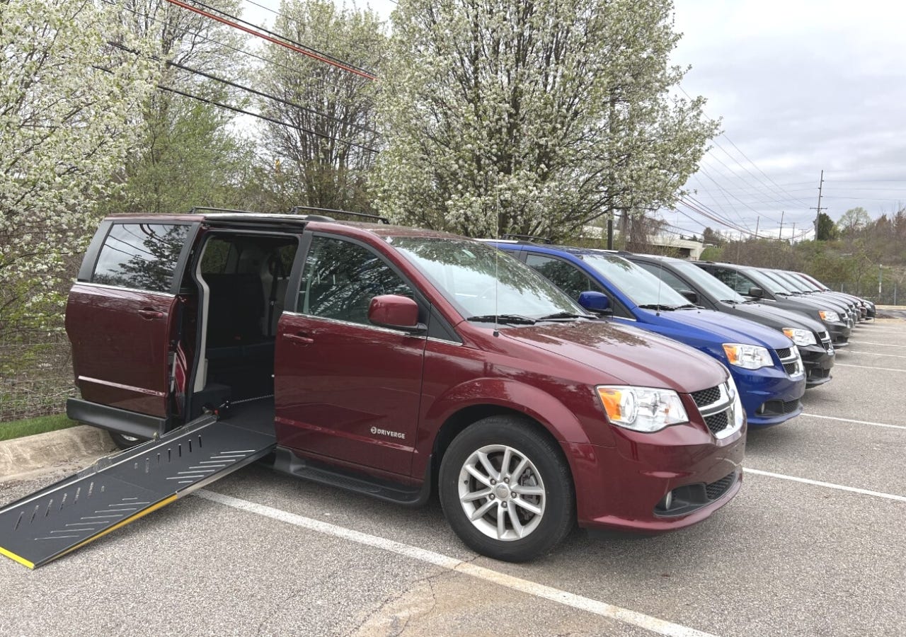 wheelchair accessible vans in parking lot