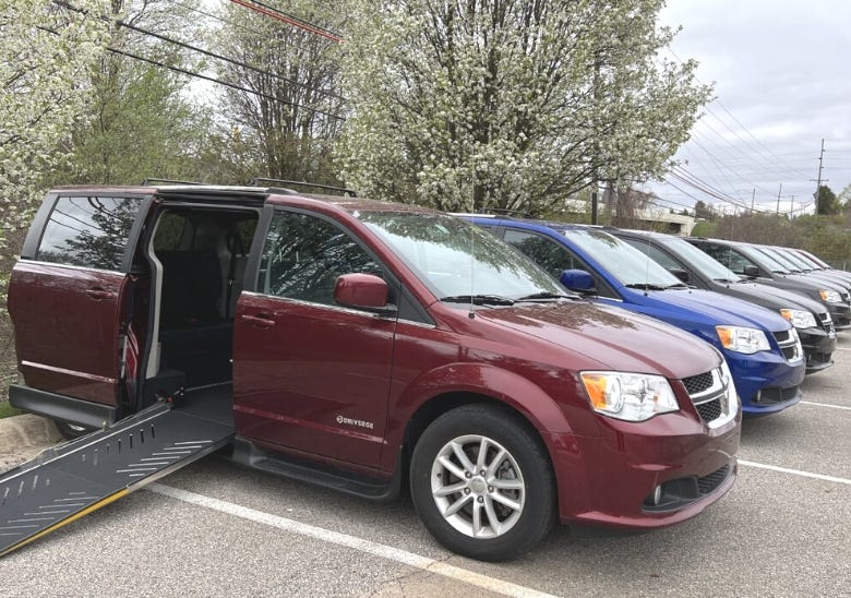 wheelchair accessible vans in parking lot